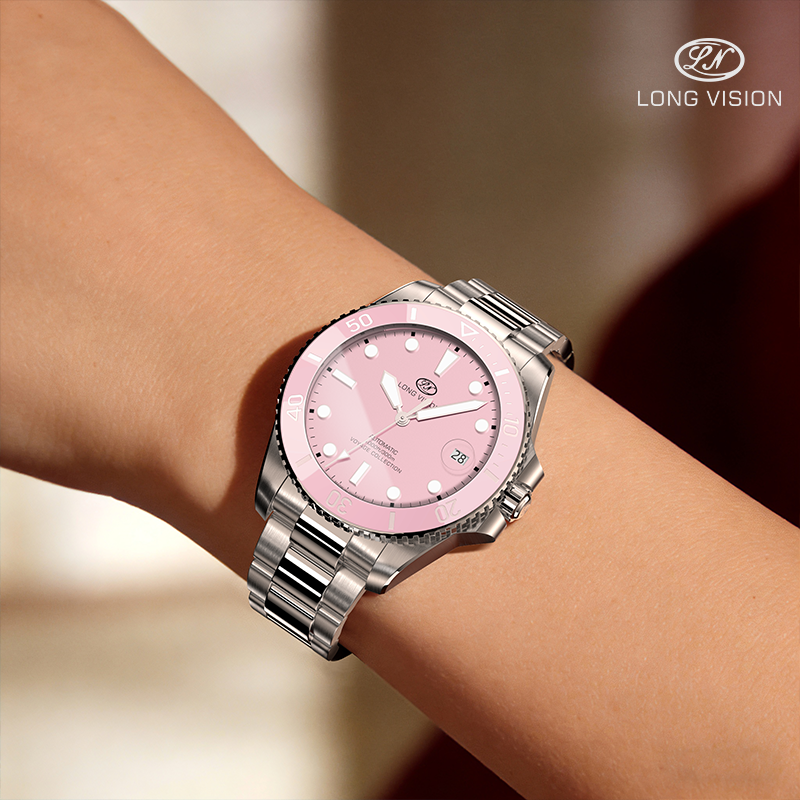 Long Vision YH019T Voyage Collection automatic watch on wrist, showcasing pink dial and silver bracelet.